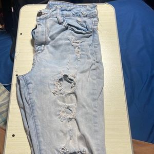 Very well worn ripped jeans